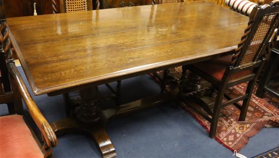 A 17th century style oak refectory table L.185cm